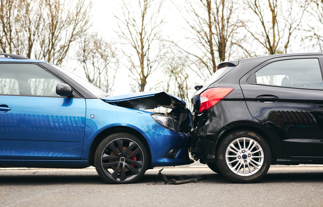 Two Damaged Cars Involved in Road Traffic Accident